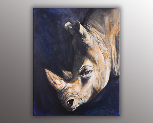 Portrait animalier de l'artiste Helena Monniello représentant un rhinocéros dans l'ombre et la lumière.